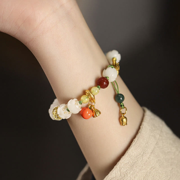 Bracelet d'harmonie et de paix en perles de citrouille et de lotus en Buddha Stones naturelles