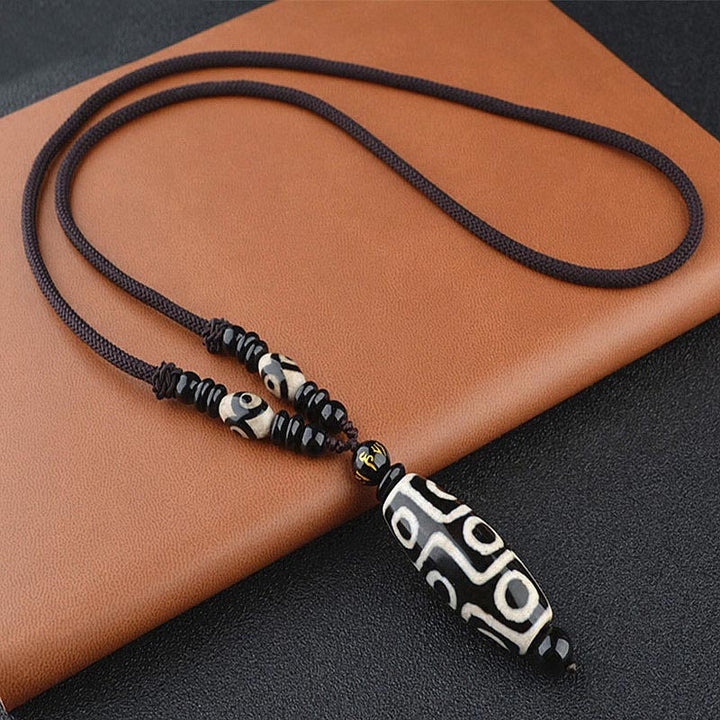 Collier de protection de richesse en perles Dzi à neuf yeux de Buddha Stones