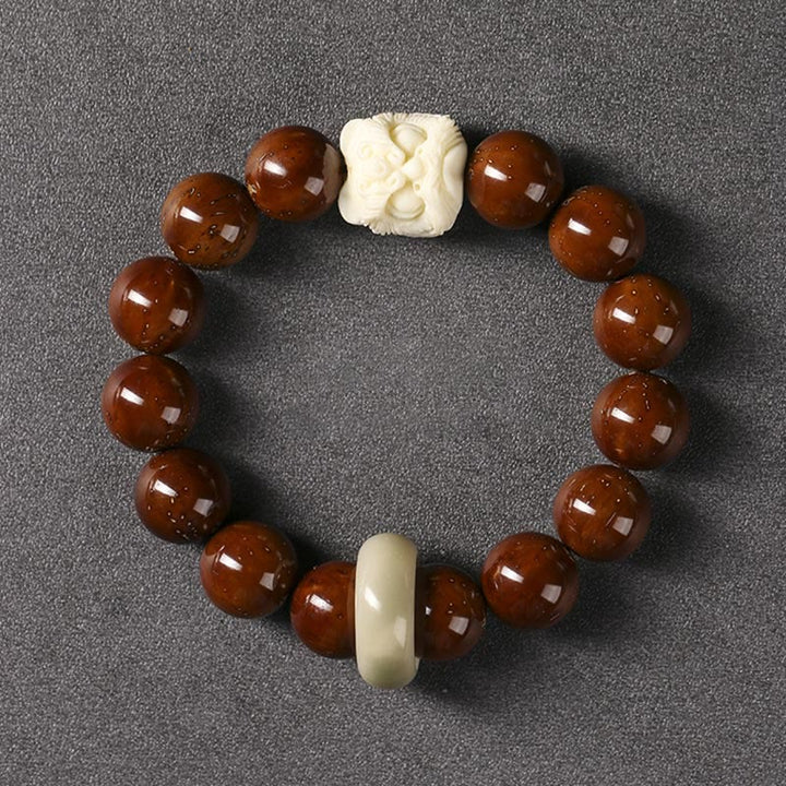 Bracelet de sagesse du lion dansant en Buddha Stones et graines de Bodhi violettes