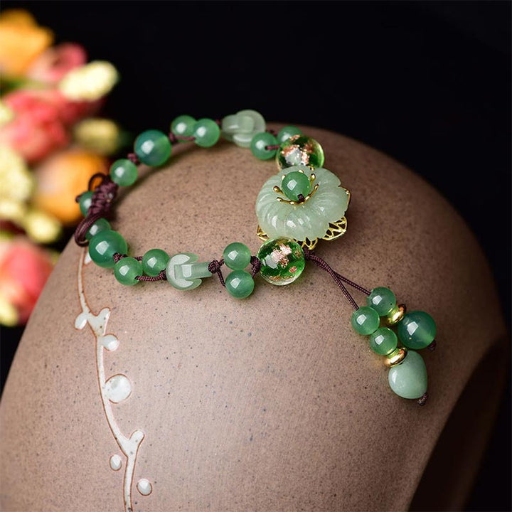 Bracelet porte-bonheur en jade vert naturel Buddha Stones et fleur pendante
