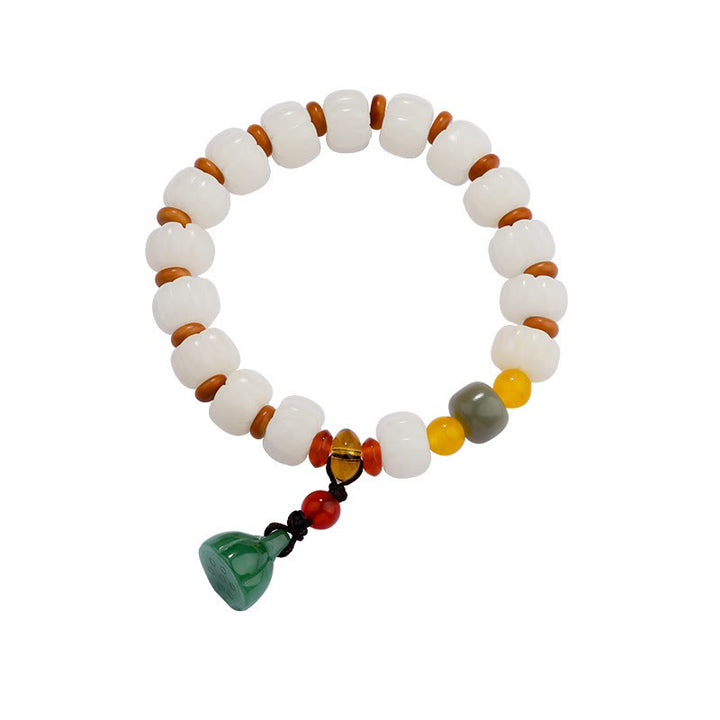 Bracelet en perles de citrouille gravées en agate rouge Bodhi Calme Harmonie Bodhi Graines naturelles Lotus