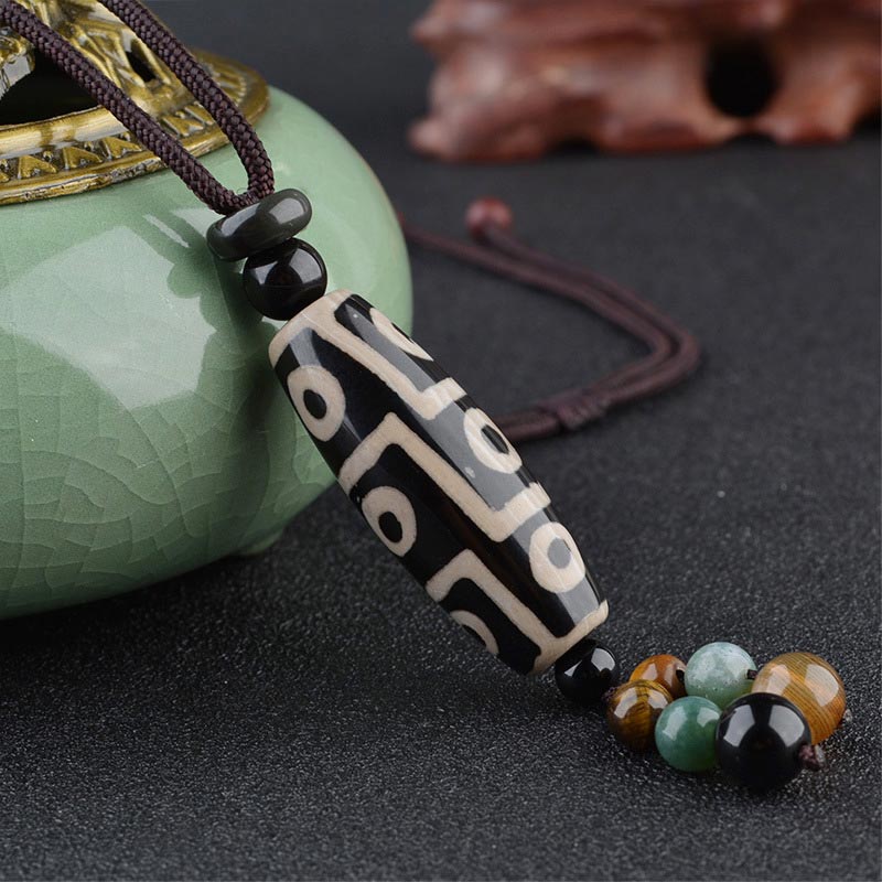 Collier de protection de richesse en perles Dzi à neuf yeux de Buddha Stones
