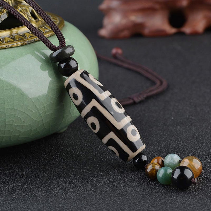 Collier de protection de richesse en perles Dzi à neuf yeux de Buddha Stones