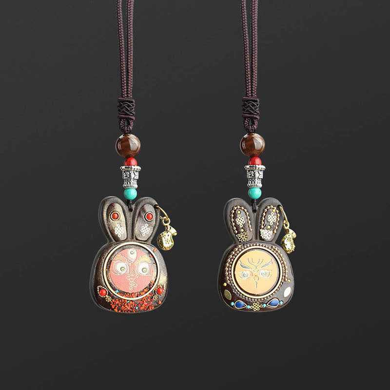 Collier pendentif Thangka en ébène du Tibet représentant les cinq dieux de la richesse