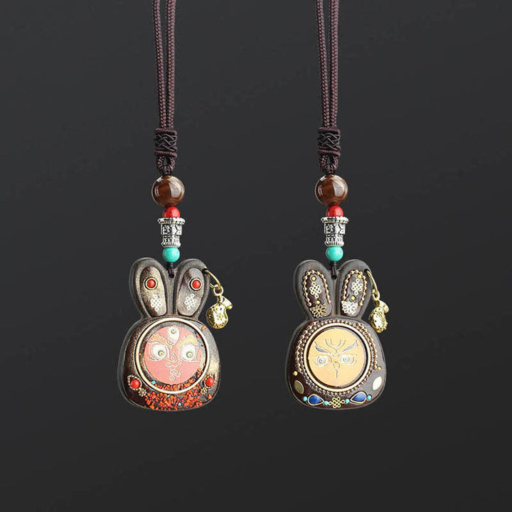 Collier pendentif Thangka en ébène du Tibet représentant les cinq dieux de la richesse