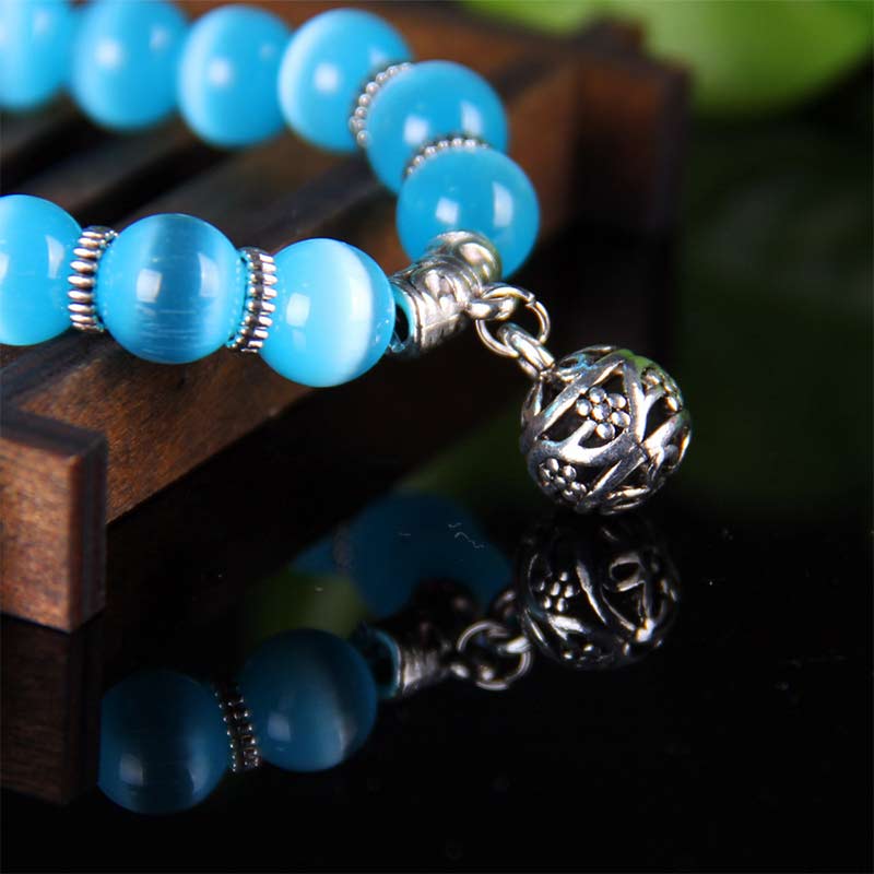 Bracelet porte-bonheur tibétain œil de chat Buddha Stones