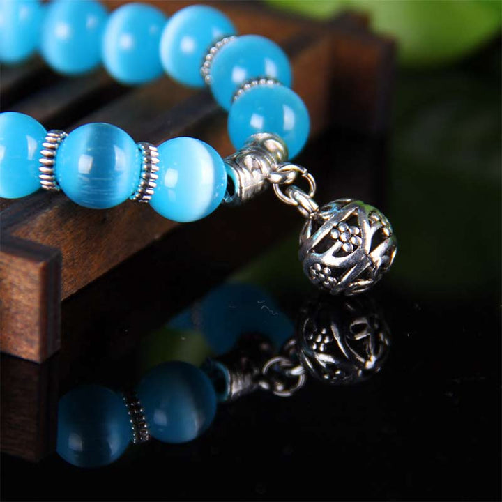 Bracelet porte-bonheur tibétain œil de chat Buddha Stones