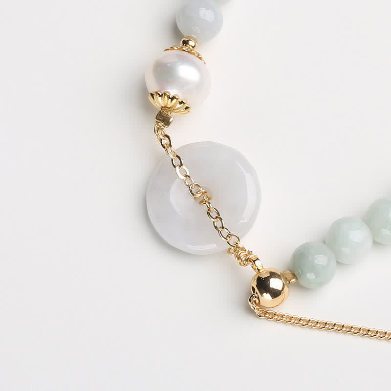 Bracelet de prospérité avec boucle de paix et perles de jade naturelles en Buddha Stones