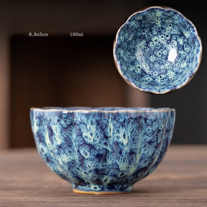Tasse à thé en céramique à motif de fleurs de pêcher avec Buddha Stones
