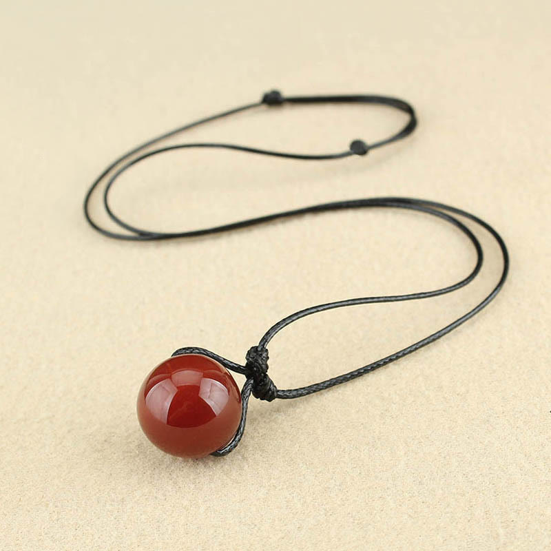 Collier avec pendentif en cuir et perles d'agate rouge de Buddha Stones