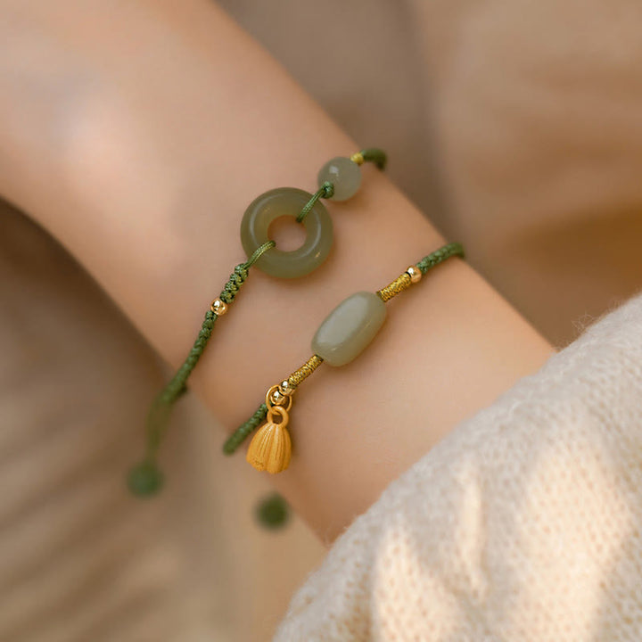 Bracelet en corde avec perles porte-bonheur et breloque en jade et Buddha Stones