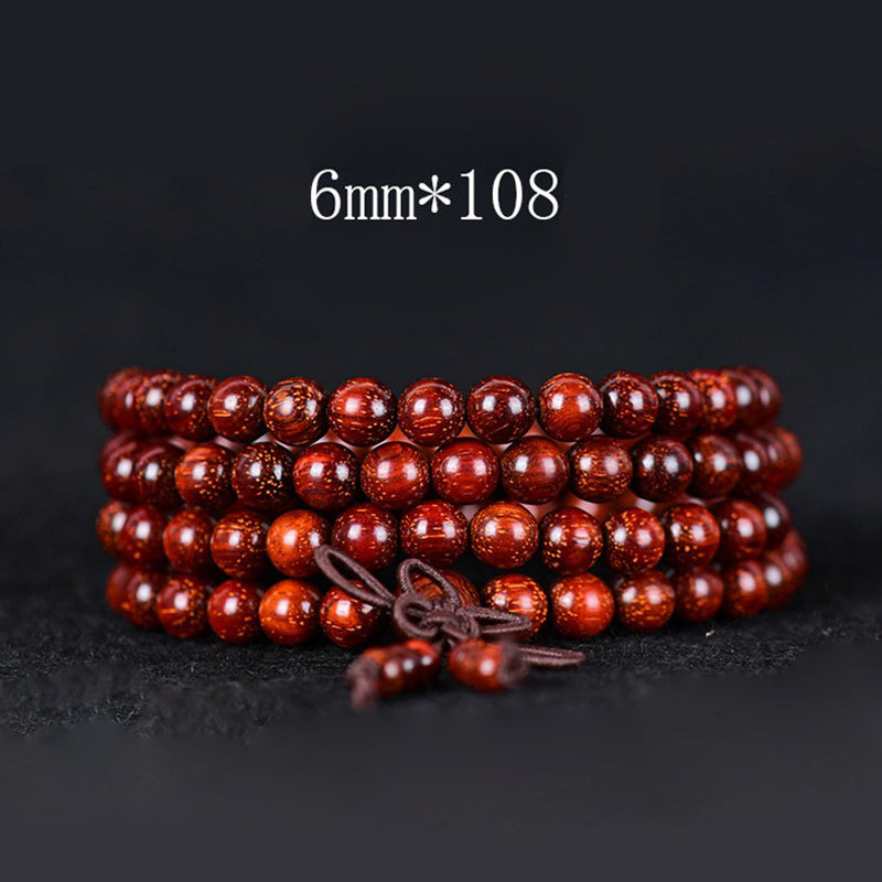 Bracelet d'équilibre tibétain en petites feuilles de santal rouge avec Buddha Stones