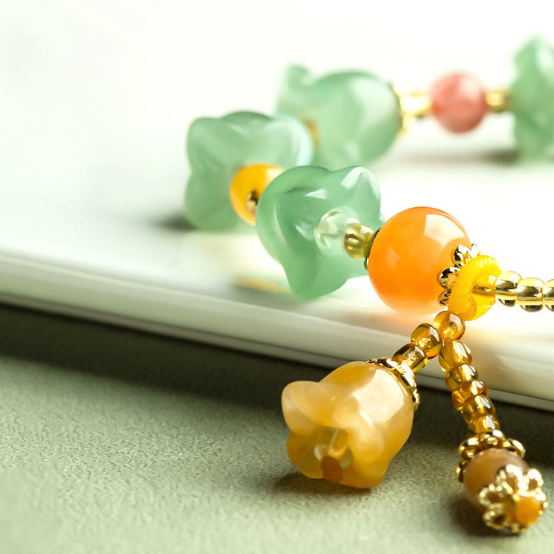 Bracelet porte-bonheur en aventurine verte et fleur de magnolia de Buddha Stones