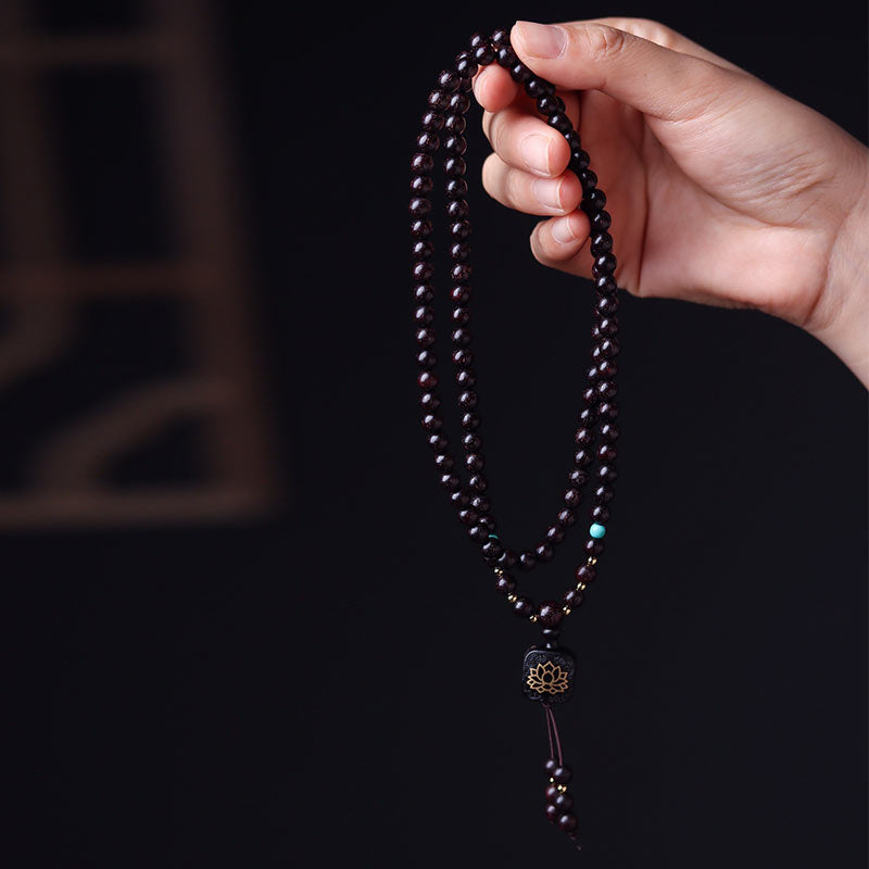 Bracelet Mala 108 Buddha Stones tibétaines en bois de santal rouge et lotus avec petites feuilles - image 1
