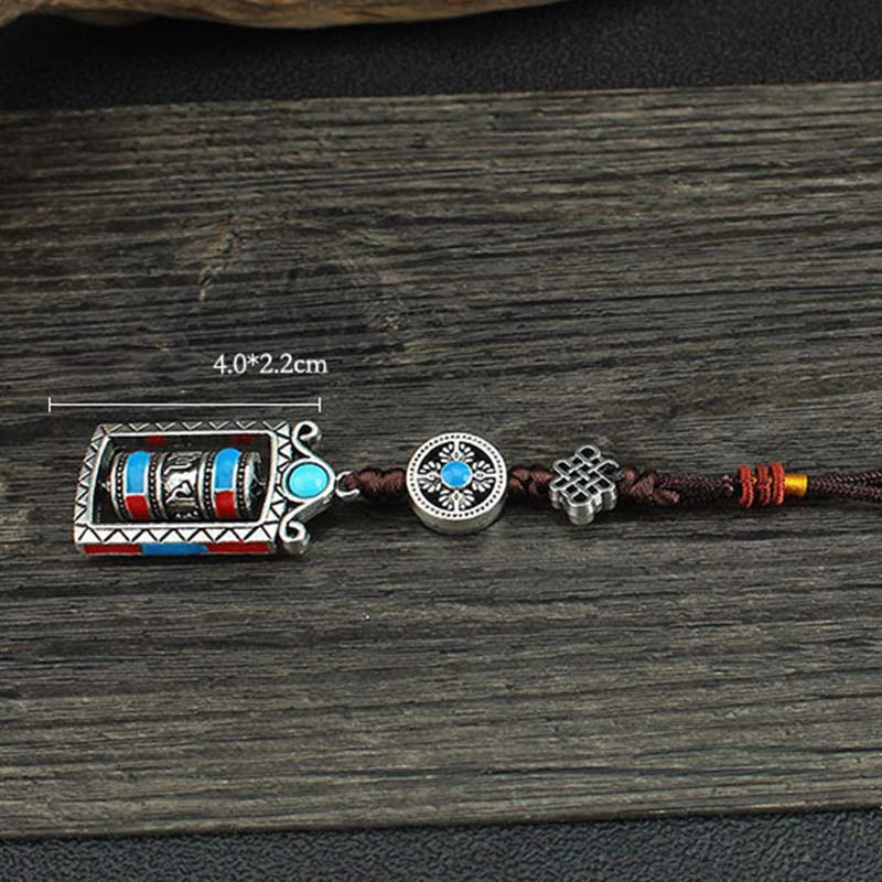 Porte-clés décoratif avec nœud rotatif et bénédiction en forme de roue de prière en six mots vrais en Buddha Stones