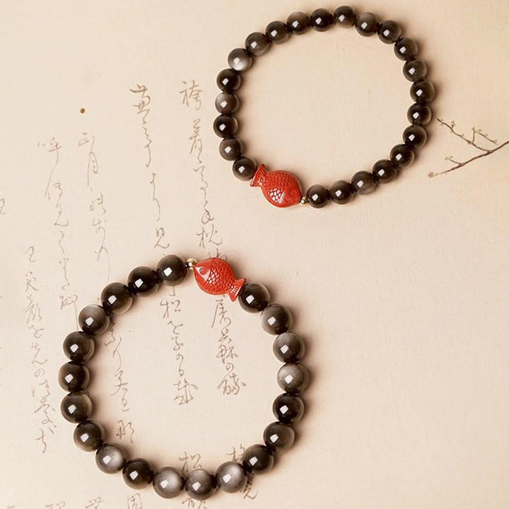 Bracelet de protection apaisante en obsidienne et cinabre avec Buddha Stones et reflets argentés naturels