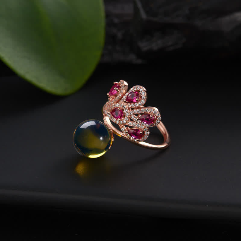 Collier pendentif et bague en ambre avec symbole de la fortune et de l'amour