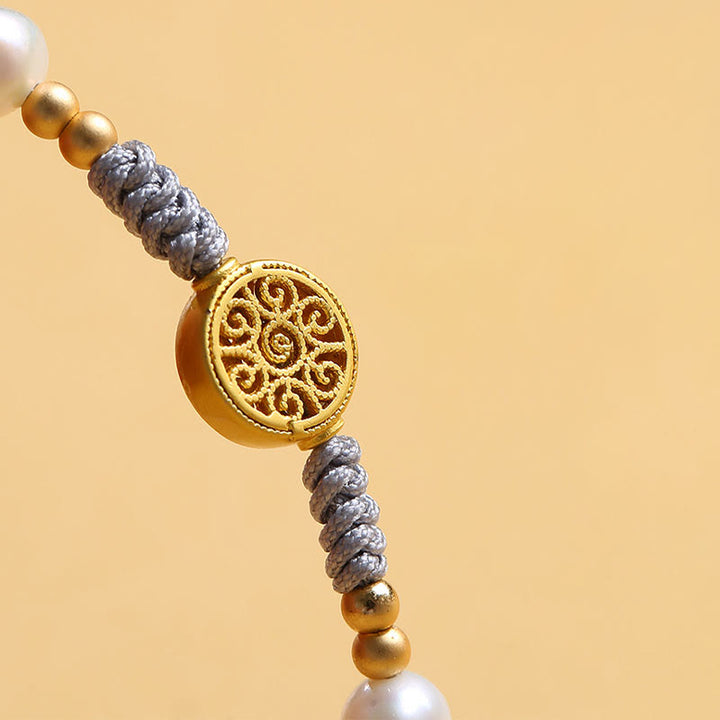 Bracelet tressé en corde bleue avec perles et arbre de fortune en cuivre et Buddha Stones