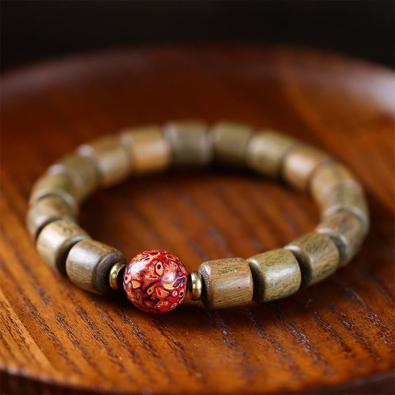 Bracelet de paix en Buddha Stones de bois de santal vert naturel et petites feuilles de bois de santal rouge laqué