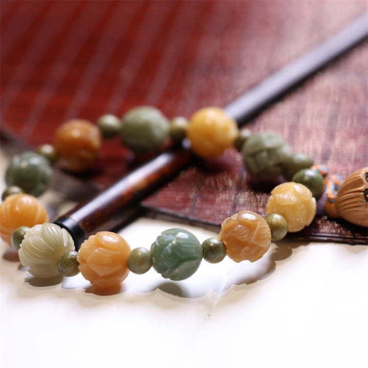 Bracelet d'harmonie de sagesse en bois de santal vert et graines de lotus Bodhi Buddha Stones