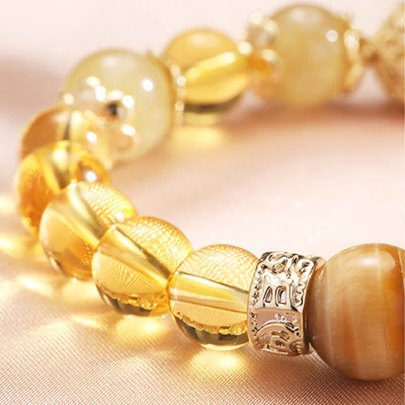 Bracelet de perles de prospérité et de générosité en Buddha Stones et citrine