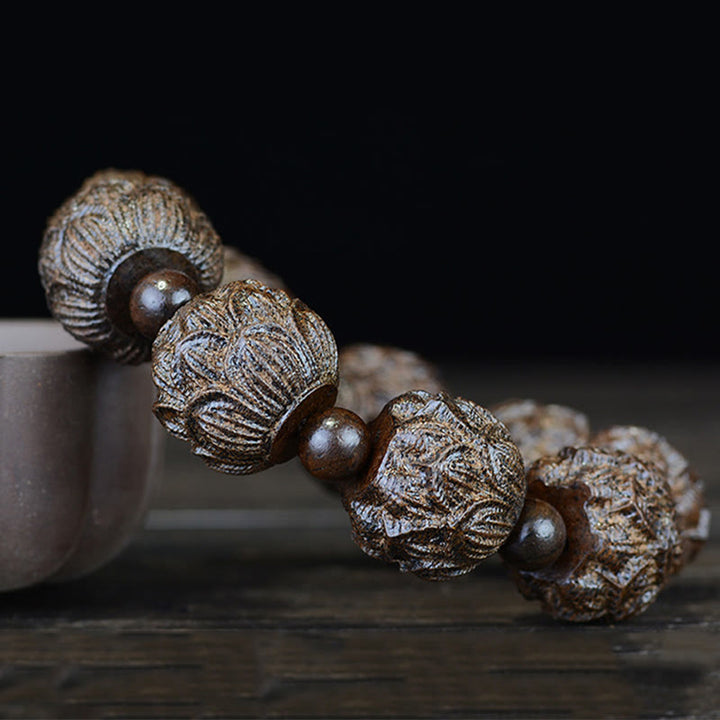 Bracelet d'équilibre gravé en bois d'ébène avec Buddha Stones et dragon de lotus des dix-huit arhats