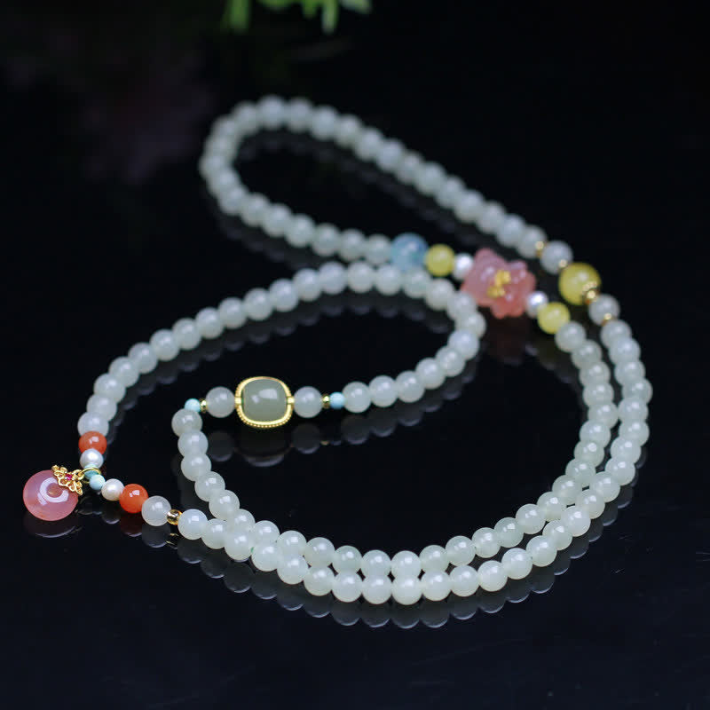 Bracelet en Buddha Stones en jade Hetian naturel avec cristal rose et boucle de paix pour le bonheur et l'abondance
