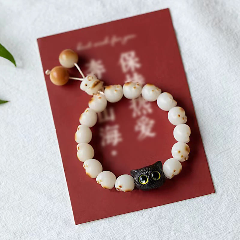 Bracelet de paix porte-bonheur en bois de santal rouge avec de belles pattes de Buddha Stones et des graines de Bodhi naturelles - image 11