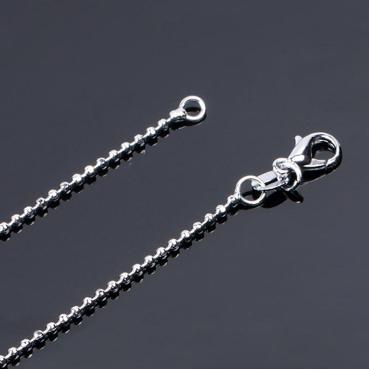 Collier pendentif porte-bonheur en cristal naturel avec petites ailes d'ange de Buddha Stones