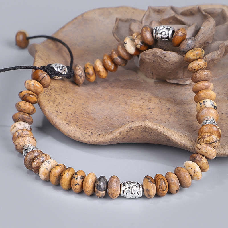 Bracelet en fil de perles positives en jaspe photo