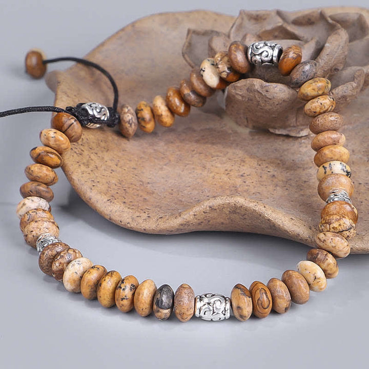 Bracelet en fil de perles positives en jaspe photo