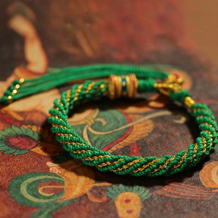 Bracelet tibétain en corde tressée avec breloque porte-bonheur Thangka en Buddha Stones