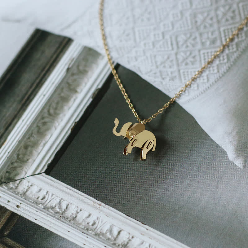 Collier porte-bonheur en acier titane avec pendentif éléphant