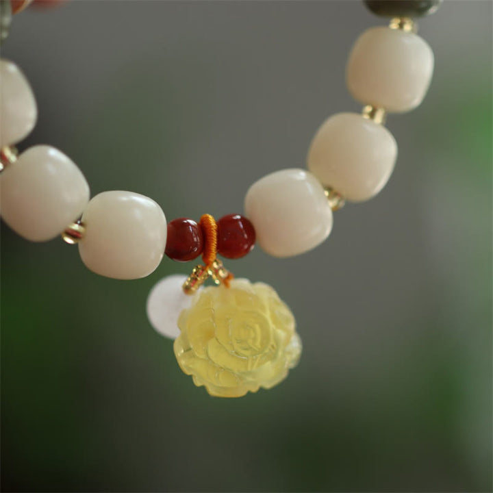 Bracelet de paix en ambre et graines de Bodhi avec Buddha Stones dégradées