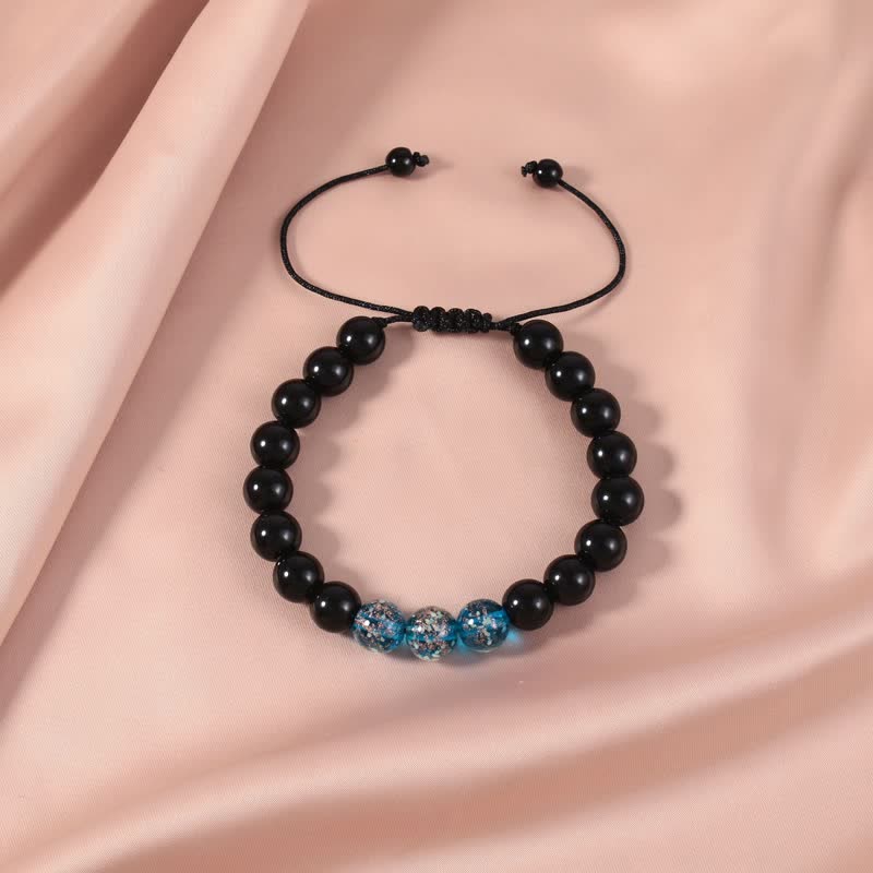 Bracelet de force lumineux en obsidienne noire Buddha Stones