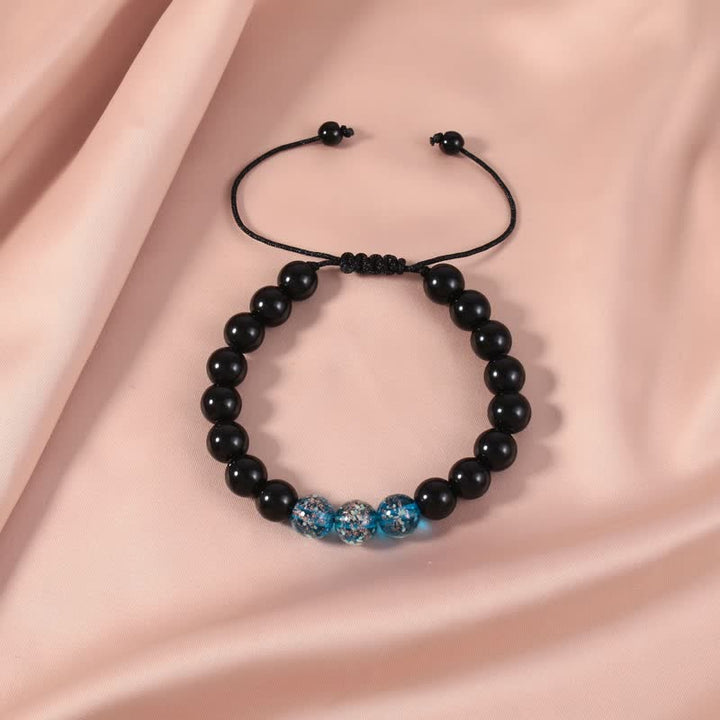 Bracelet de force lumineux en obsidienne noire Buddha Stones