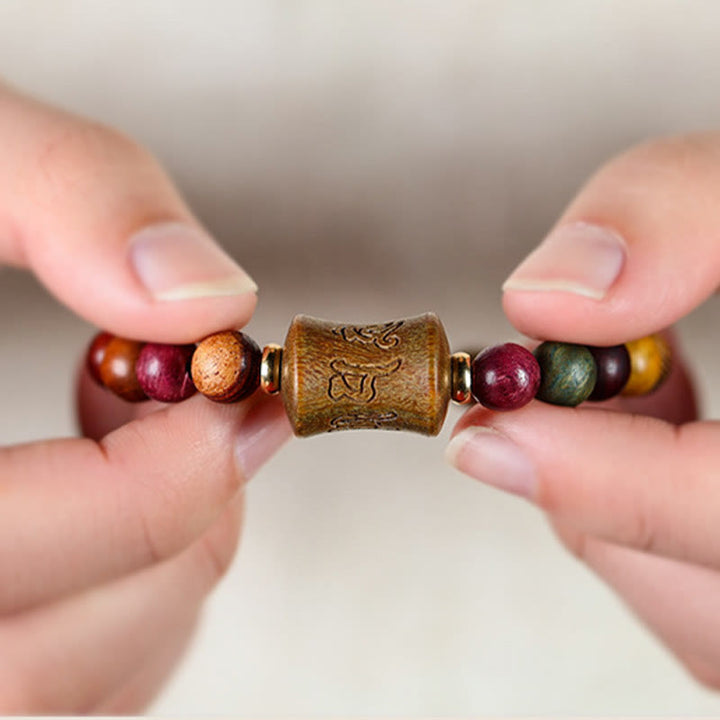 Bracelet de protection Om Mani Padme Hum en bois de santal multicolore du Tibet