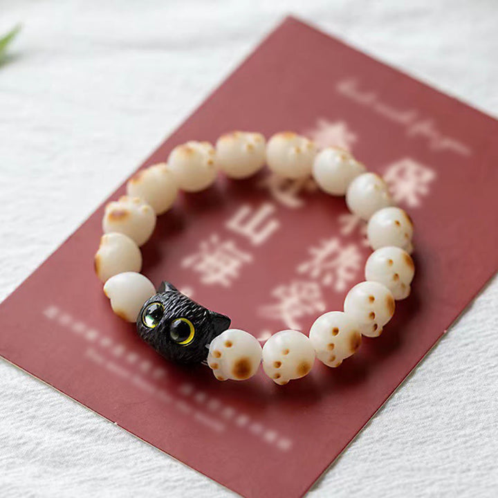 Bracelet de paix porte-bonheur en bois de santal rouge avec de belles pattes de Buddha Stones et des graines de Bodhi naturelles - image 4