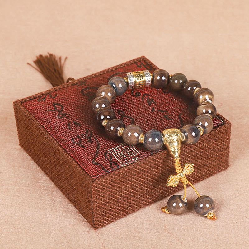 Bracelet de sagesse en perles de verre gravées Buddha Stones et roue de prières tibétaines Om Mani Padme Hum Dorje Vajra