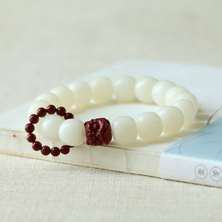 Buddha Stones de Bodhi Naturelles Cinabre Lion Dansant Charme Sagesse Harmonie Poignet Mala