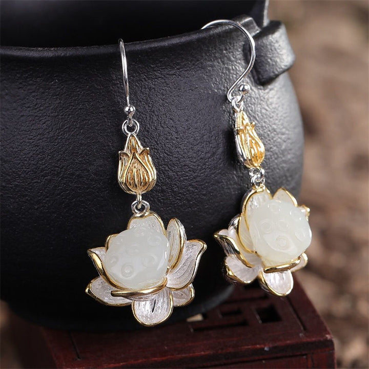 Boucles d'oreilles pendantes en jade blanc et Buddha Stones