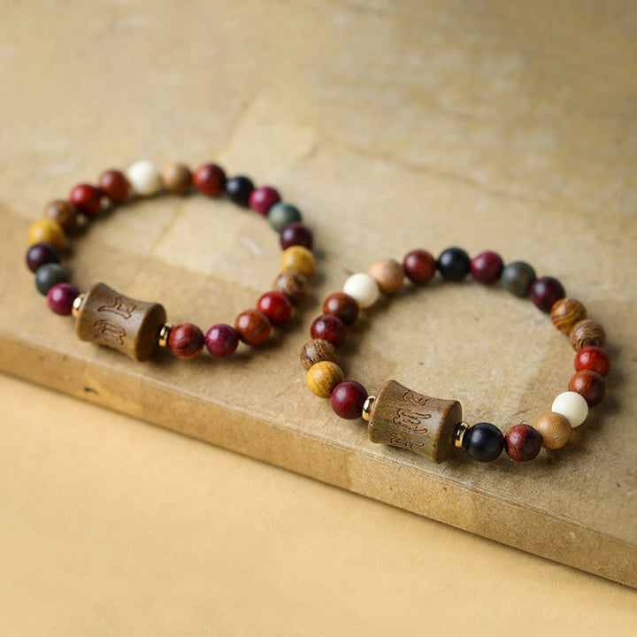 Bracelet de protection Om Mani Padme Hum en bois de santal multicolore du Tibet
