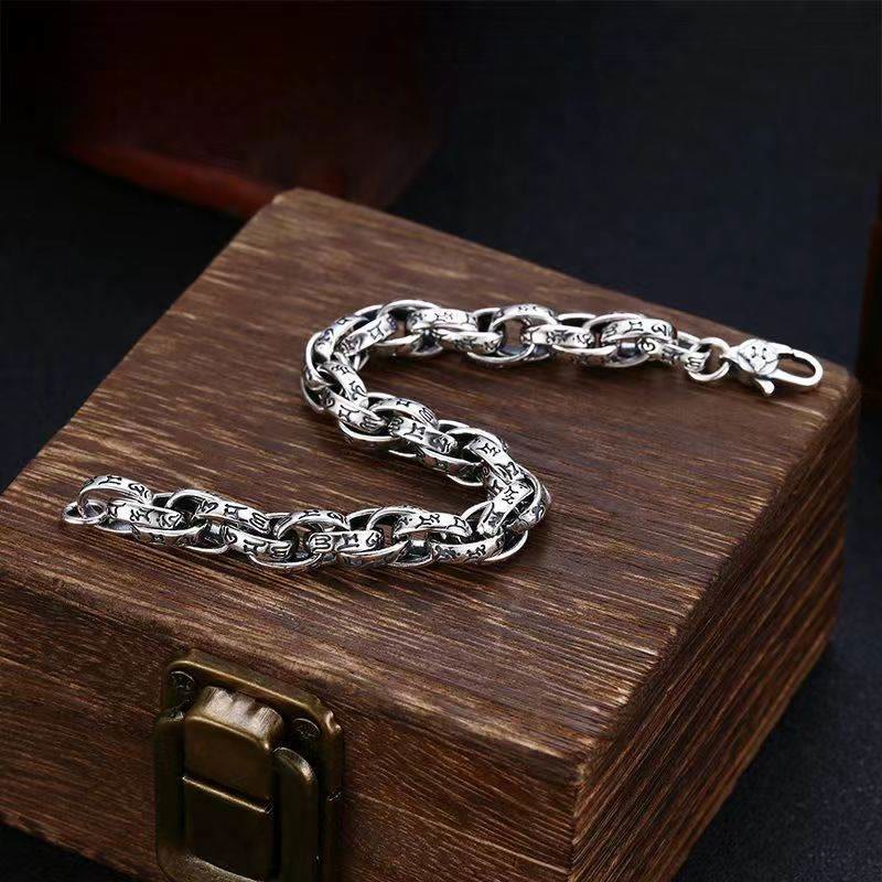 Bracelet tibétain en Buddha Stones avec amulette sculptée Om Mani Padme Hum