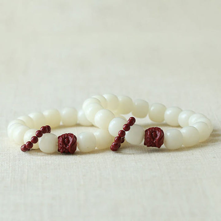 Buddha Stones de Bodhi Naturelles Cinabre Lion Dansant Charme Sagesse Harmonie Poignet Mala