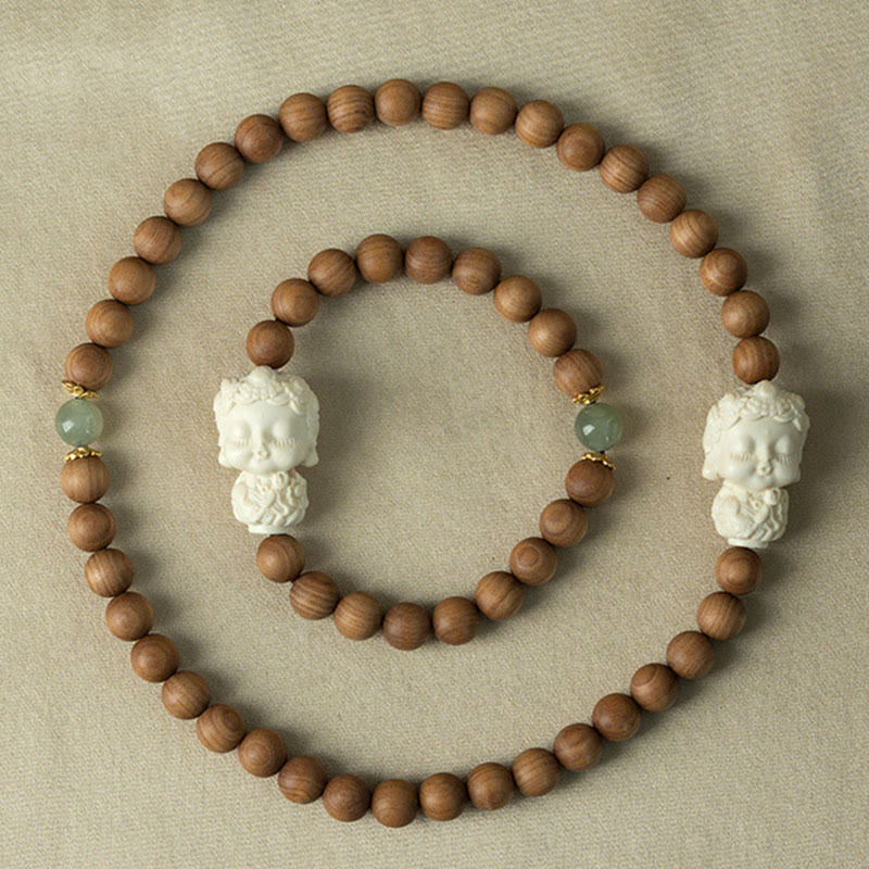 Bracelet de protection Tara verte en Buddha Stones en bois de santal et jade Hetian