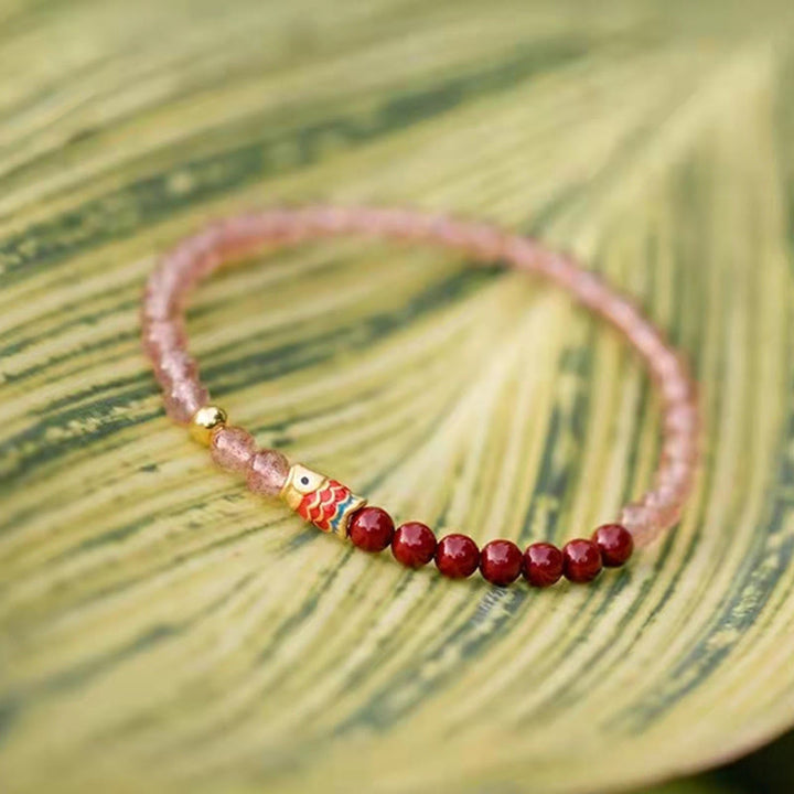 Bracelet de guérison porte-bonheur en quartz fraise et cinabre en Buddha Stones