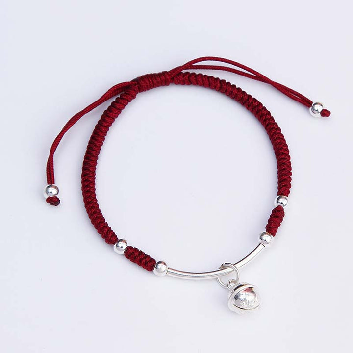 Bracelet Feng Shui porte-bonheur avec clochette rouge et Buddha Stones