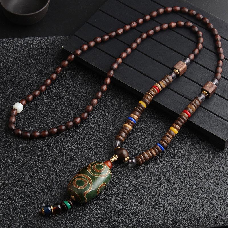 Collier de méditation en bois de wengé Buddha Stones en turquoise et perles Dzi