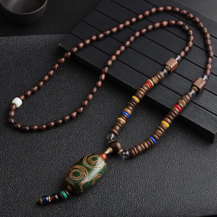 Collier de méditation en bois de wengé Buddha Stones en turquoise et perles Dzi