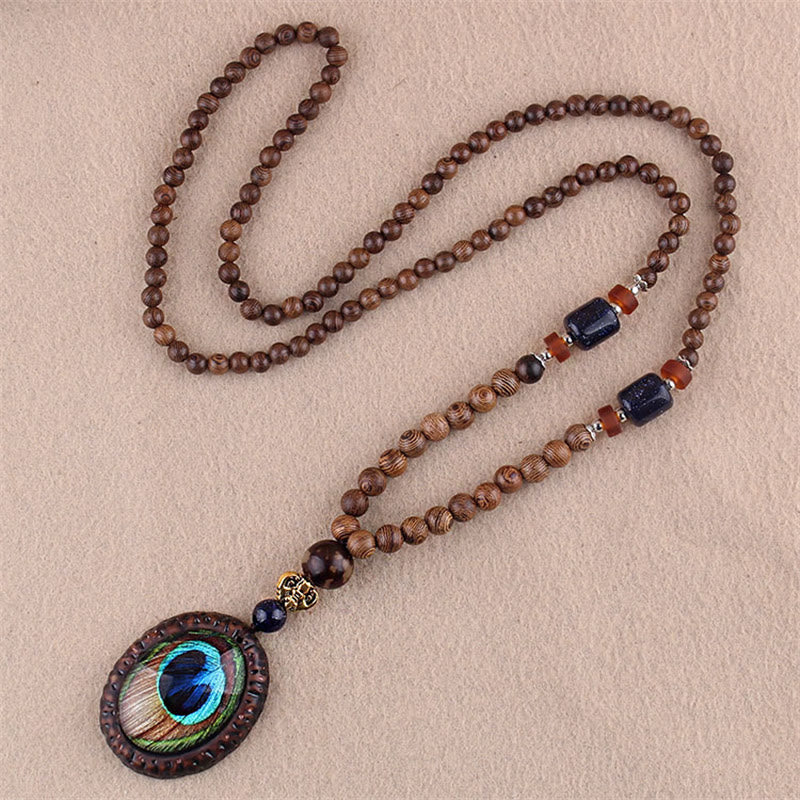Collier pendentif protection éléphant en Buddha Stones tibétain en bois de wengé Bodhi Seed Agate